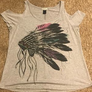 Shirt with cut outs on shoulders